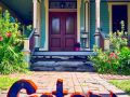Gators Logo in Front of House
